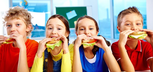 Students eating sandwiches